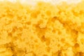 Texture worn yellow sponge for washing dishes , close-up abstract background Royalty Free Stock Photo