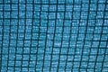 The texture of the woven mesh is blue. Fishnet. Background image of woven mesh fibers. The texture of nets for fishing Royalty Free Stock Photo