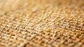 The texture of the woven straw mat is both rough and smooth with tiny bumps and grooves adding depth and character