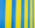 Texture yellow end bluecocktail sticks. yellow end blue vertical Royalty Free Stock Photo