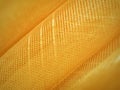 Texture of yellow mosquito nets with some of the blurred