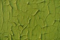 Texture of yellowish green peeling and cracking paint Royalty Free Stock Photo