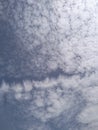 Textured Altocumulus Clouds in a Bright Blue Sky Royalty Free Stock Photo