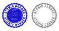 Textured ATOMIC DANGER Grunge Stamp Seals Royalty Free Stock Photo