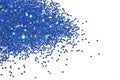 Textured background with blue glitter sparkle on white, decorative spangles Royalty Free Stock Photo