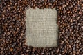 Textured background of coffee beans in the shape of a square frame top view. Concept love for a fresh and fragrant drink Royalty Free Stock Photo