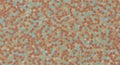 Abstract mosaic pattern of small irregular shapes in earthy and muted blue tones Royalty Free Stock Photo