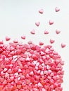 lots of small decorative candy pink hearts