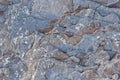 Textured background of pieces of slate stone with gray and brown colors