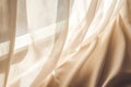textured beige linen curtains in sunlight Royalty Free Stock Photo