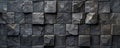 Textured black stone wall with uneven surface, abstract pattern Royalty Free Stock Photo