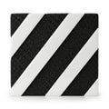 Textured black and white striped square object isolated on white background Royalty Free Stock Photo