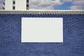 Textured blue bricks wall and blank frame Royalty Free Stock Photo