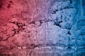 Textured broken cracked concrete wall, grunge background, red blue background