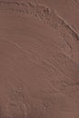 Textured brown cement wall surface, rough texture with strokes for design and background Royalty Free Stock Photo