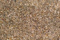 Textured of brown sandwash gravel Royalty Free Stock Photo
