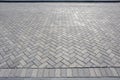 White and grey harring patterned brick floor pavement outdoors Royalty Free Stock Photo