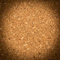 A textured close-up of a cork board, displaying a pattern of small, irregularly shaped Royalty Free Stock Photo
