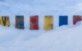 Textured Colorful Painted Blue, Red, Yellow Wooden Picket Fence Planks In Deep Snow, Colorful Rustic Style Background For Vintage Royalty Free Stock Photo