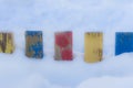 Textured Colorful Painted Blue, Red, Yellow Wooden Picket Fence Planks In Deep Snow, Colorful Rustic Style Background For Vintage Royalty Free Stock Photo