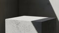 Textured Concrete Cube with Dramatic Sunlight and Shadow Play Keywords: concrete, cube, block, texture, rough Royalty Free Stock Photo