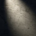 A textured concrete surface illuminated by soft, angled light. The light highlights the Royalty Free Stock Photo