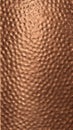 Textured Copper Metal Surface with Dimpled Pattern Royalty Free Stock Photo
