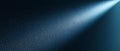 Textured dark blue surface illuminated by a bright diagonal light beam image Royalty Free Stock Photo