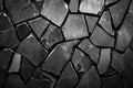 Textured dark gray irregular stone wall pattern close up Royalty Free Stock Photo
