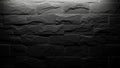 Textured Dark Gray Slate Stone Wall with Dramatic Light and Shadow Play Keywords: stone, wall, slate, texture Royalty Free Stock Photo
