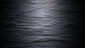 Textured Dark Grey Slate Stone Wall with Horizontal Slat Pattern and Spotlight 219 Royalty Free Stock Photo