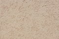 Textured decorative plaster wall texture background coral color