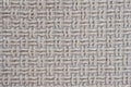 Textured fabric mat with woven wool beige yarn closeup shot