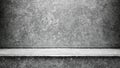 textured gray concrete surface provides a neutral backdrop for various creative applications, featuring a horizontal ledge that Royalty Free Stock Photo