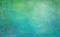 Textured green and blue abstract background with a fine crackle pattern creating a visually engaging artistic
