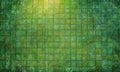 textured green and yellow grid pattern fills the frame, with bright light source at the top left corner. Royalty Free Stock Photo