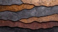Textured layers of dark and rusty rock