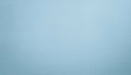 A textured, light blue background with subtle horizontal lines