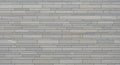 Textured Light Gray Stone Wall with Horizontal Rectangular Slat Pattern background Royalty Free Stock Photo