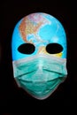 Textured mask with map wearing surgical mask. Concept for corona virus pandemia