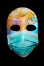 Textured mask with map wearing surgical mask. Concept for corona virus pandemia