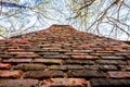 textured multicolored brick chimney on vintage cabin in Georgia