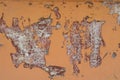 textured orange wall background with peeling paint Royalty Free Stock Photo