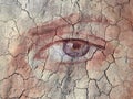 Textured and Painted Eye on Cracked earth