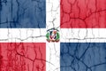 Textured photo of the flag of Dominican Republic with cracks