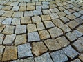 Textured and rustic cube quartz stone pavement detail of square shapes loosely set