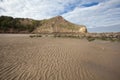 Textured sand and headlands at Cayton Bay