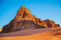 Textured sand mountain of red and orange sand against the blue sky, Jordan, Wadi Rum desert Royalty Free Stock Photo