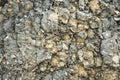 Textured stone background Rubble ballast in natural form in the rock wall