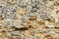 Textured stone background Rubble ballast in natural form in the rock wall